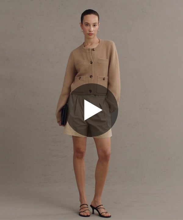 Model wearing Charlotte Cardigan in Camel.