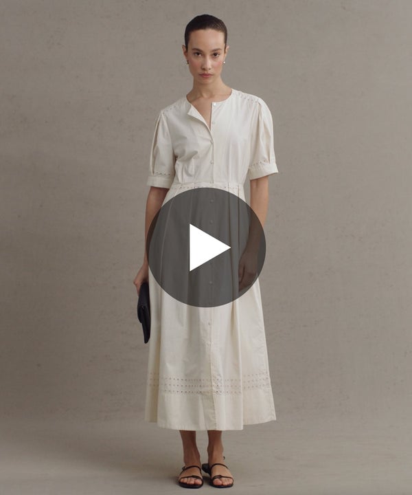 Model wearing Harper Dress in Warm Ivory.