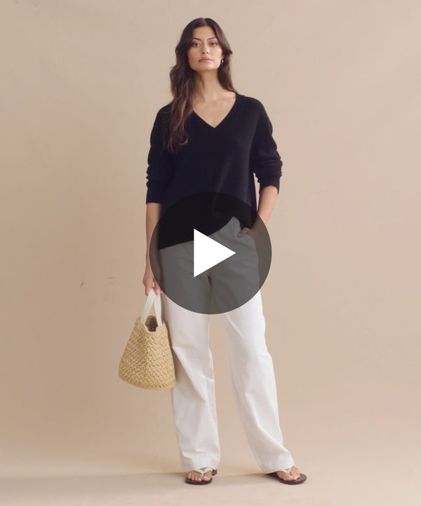 Model wearing Simone V-Neck in Black.