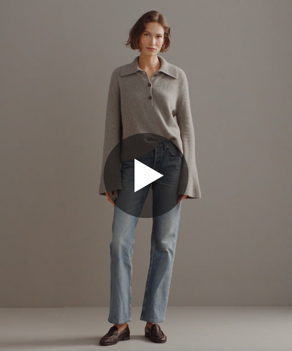 Model walking in-studio wearing Stevie Cashmere Polo.